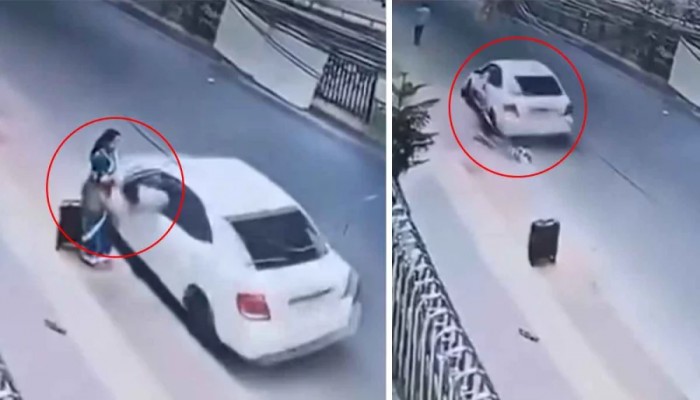 চলন্ত প্রাইভেটকার থেকে ভ্যানিটিব্যাগে টান, টেনে নিয়ে গেল নারীকে